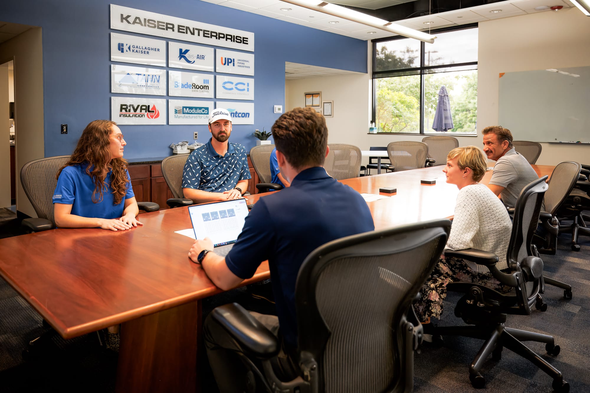 UPI colleagues meeting around a conference table