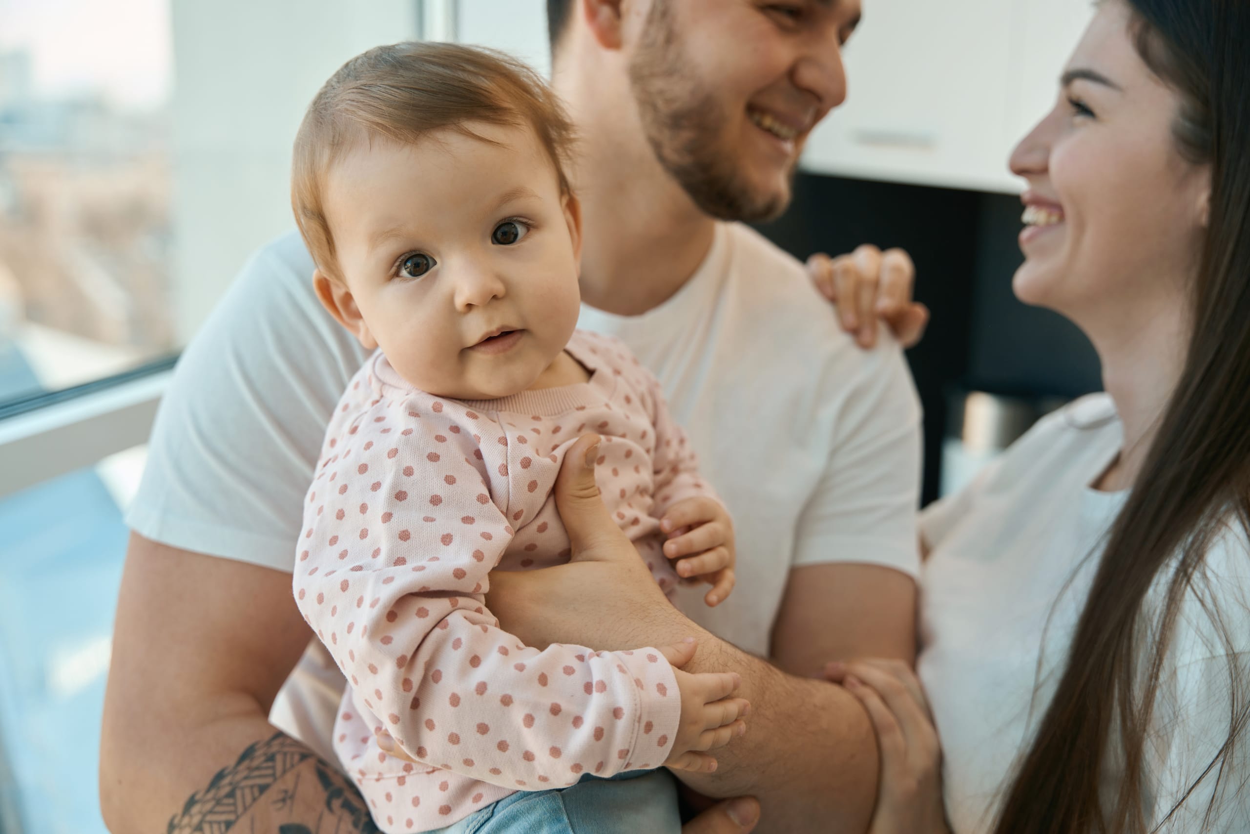 Parents spending time with their baby