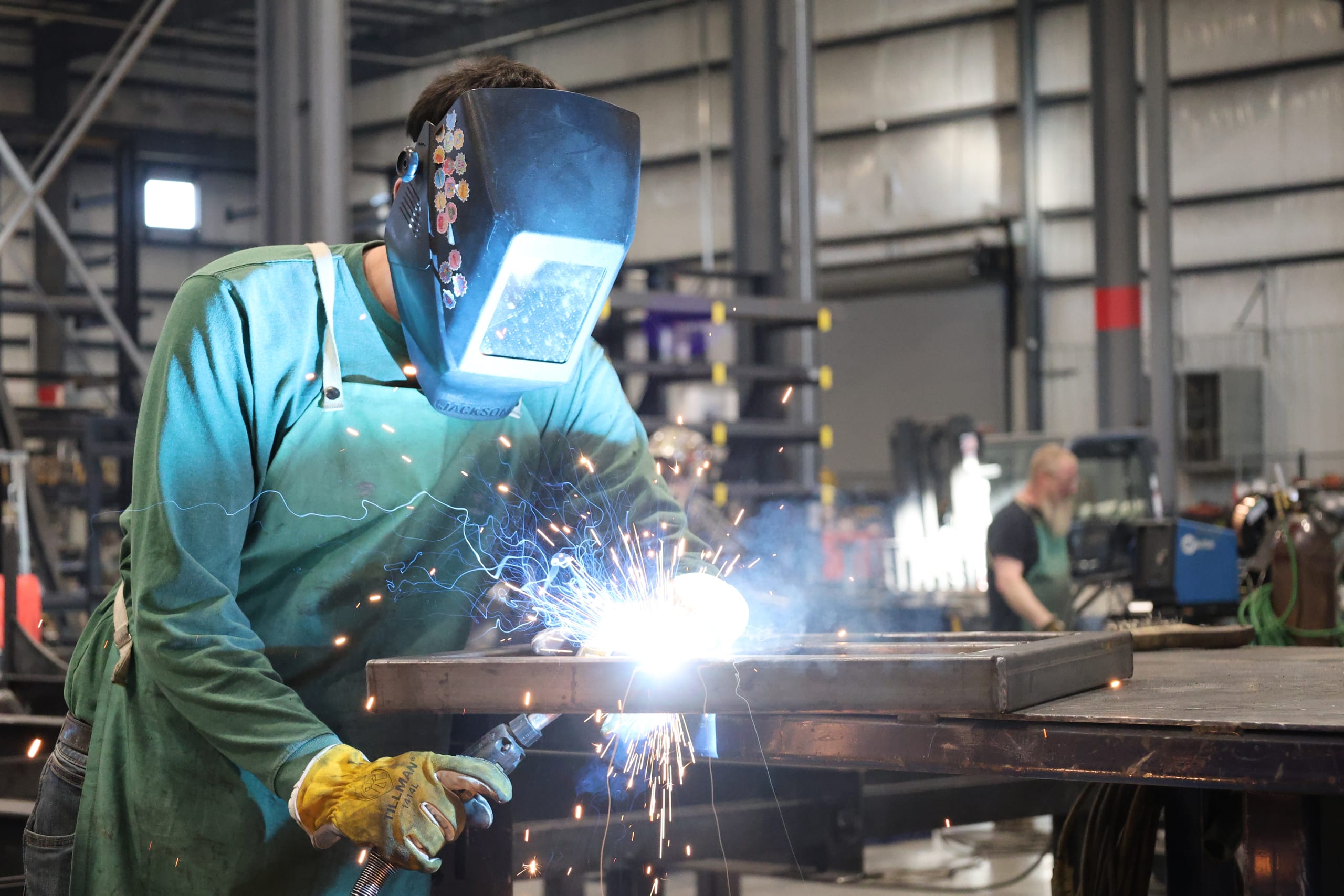 Welder working on modular fabrication