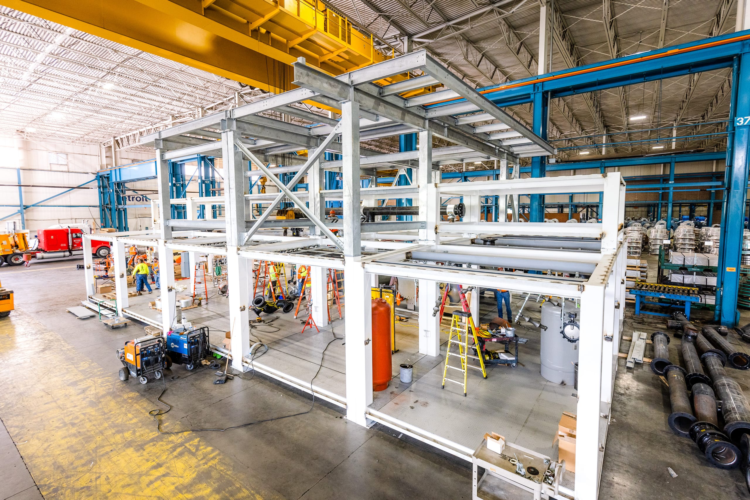 Utility generation systems inside an industrial facility